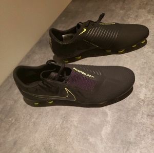 Black and yellow soccer  cleats